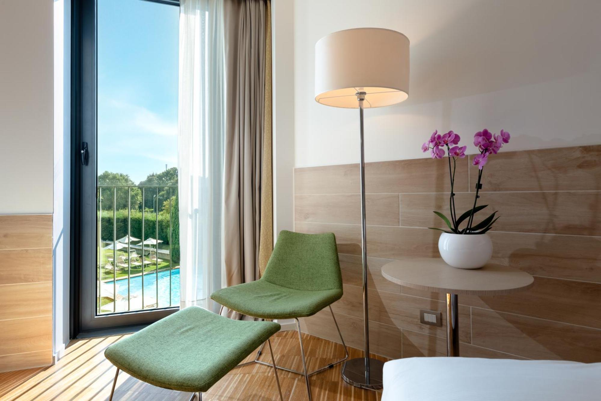 Camera King Superior con Balcone